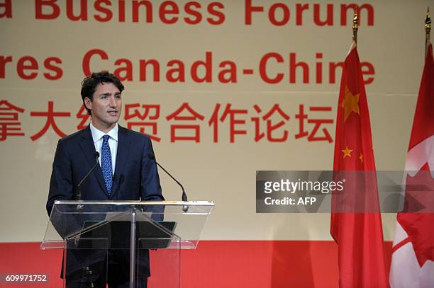 Canadian Prime Minister Justin Trudeau speaks on September 23, 2016 at a conference of the Canada China Business Council in Montreal, Quebec during...