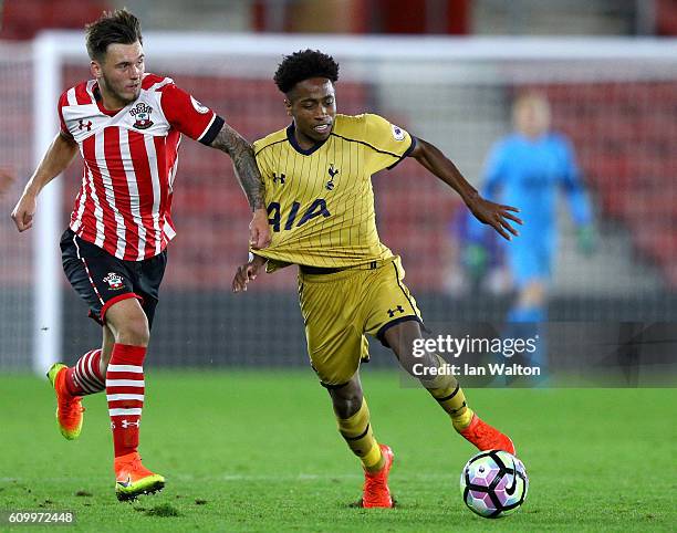 Harley Willard of Southampton tries to tackle Kyle Walker-Peters of Tottenham Hotspur during the Premier League 2 match between Southampton v...