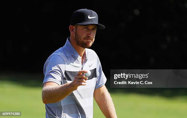 Kevin Chappell waves to the gallery after a birdie on the seventh hole during the second round of the TOUR Championship at East Lake Golf Club on...