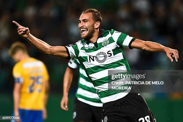 Sporting's Dutch forward Bas Dost celebrates a goal during the Portuguese league football match Sporting CP vs GD Estoril Praia at the Jose Alvalade...