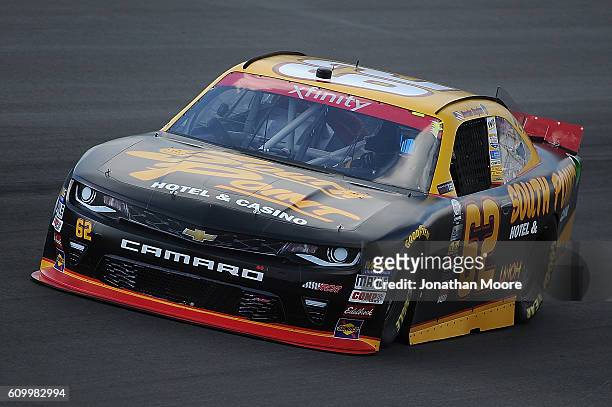 Brendan Gaughan, driver of the South Point Chevrolet, on track during practice for the NASCAR XFINITY Series VysitMyrtleBeach.com 300 at Kentucky...