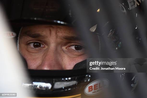 Daniel Suarez, driver of the DEWALT FLEXVOLT Toyota, sits in his car during practice for the NASCAR XFINITY Series VysitMyrtleBeach.com 300 at...