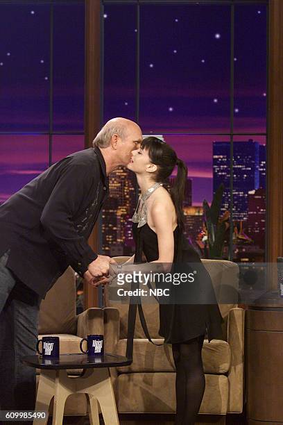 Episode 2638 -- Pictured: Former professional football player Terry Bradshaw and actress Mia Kirshner on January 27, 2004 --