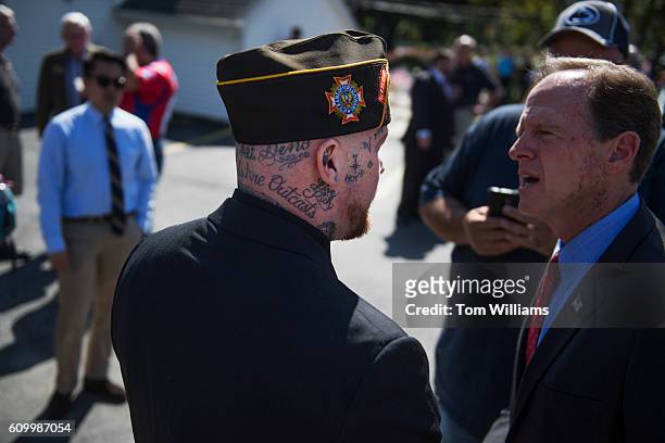 Sens. Pat Toomey, R-Pa., right, talks with Post Commander John Sheaffer, during a campaign event with Sen. John McCain, R-Ariz., at the Herbert W....