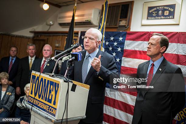 Sens. John McCain, R-Ariz., left, speaks during a campaign event for Sen. Pat Toomey, R-Pa., at the Herbert W. Best VFW Post 928 in Folsom, Pa.,...