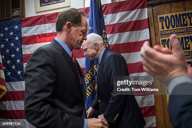 Sens. Pat Toomey, R-Pa., left, and John McCain, R-Ariz., attend a campaign event for Toomey at the Herbert W. Best VFW Post 928 in Folsom, Pa.,...