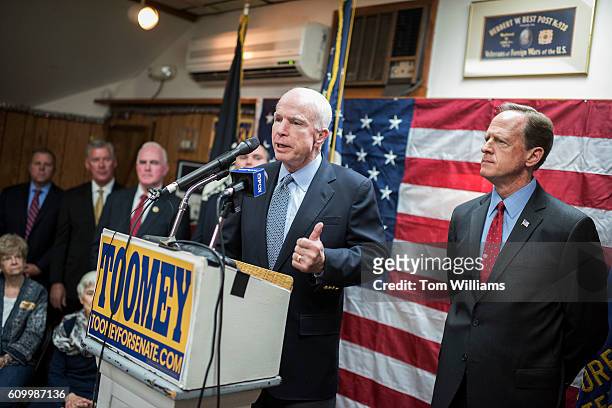 Sens. John McCain, R-Ariz., left, speaks during a campaign event for Sen. Pat Toomey, R-Pa., at the Herbert W. Best VFW Post 928 in Folsom, Pa.,...