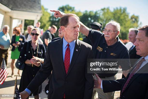 Sen. Pat Toomey, R-Pa., arrives for a campaign event at the Herbert W. Best VFW Post 928 in Folsom, Pa., September 23, 2016. Sen. John McCain,...