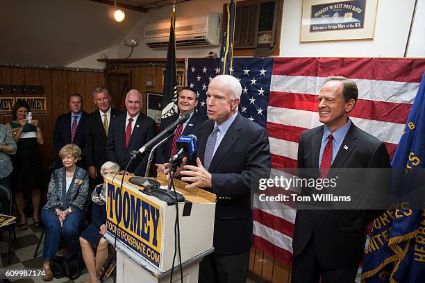 Sens. John McCain, R-Ariz., speaks during a campaign event for Sen. Pat Toomey, R-Pa., right, at the Herbert W. Best VFW Post 928 in Folsom, Pa.,...