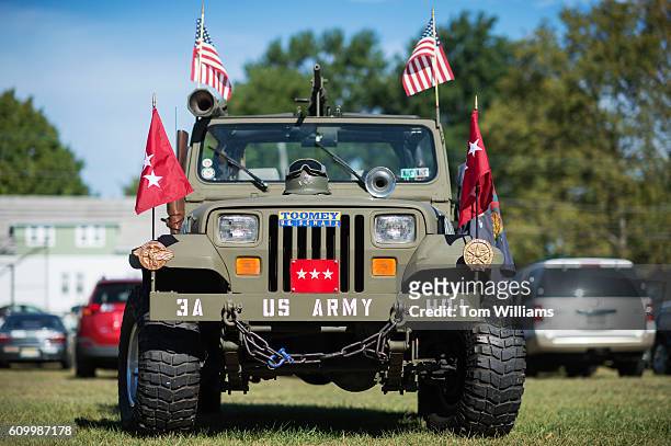 Military-style Jeep is parked outside a campaign event for Sens. Pat Toomey, R-Pa., at the Herbert W. Best VFW Post 928 in Folsom, Pa., September 23,...