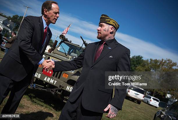 Sen. Pat Toomey, R-Pa., left, talks with Post Commander John Sheaffer, during a campaign event with Sen. John McCain, R-Ariz., at the Herbert W. Best...