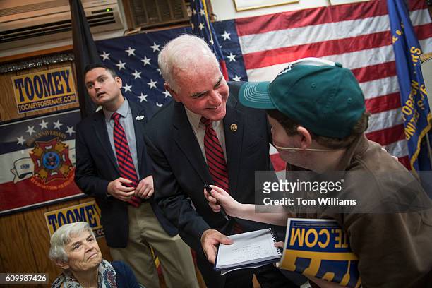 Sen. Patrick Meehan, R-Pa., talks with a guest during a campaign event for Sen. Pat Toomey, R-Pa., at the Herbert W. Best VFW Post 928 in Folsom,...