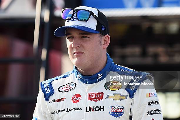 Ty Dillon, driver of the WESCO Chevrolet, stands in the garage during practice for the NASCAR XFINITY Series VysitMyrtleBeach.com 300 at Kentucky...
