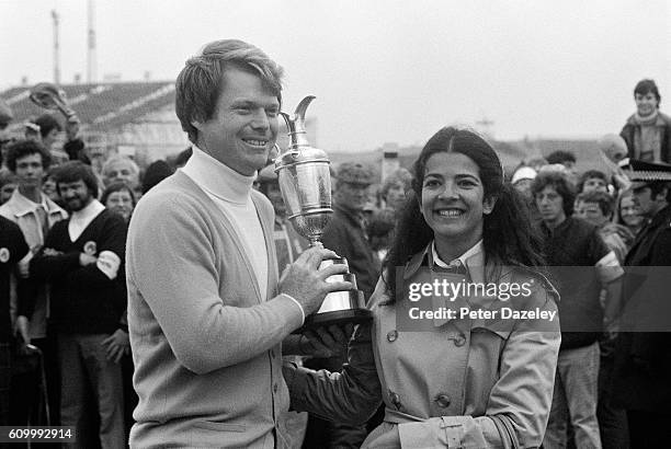 Tom Watson of the United States holds the Claret Jug with his wife Linda after the final round of the109th Open Championship played at Muirfiled Golf...