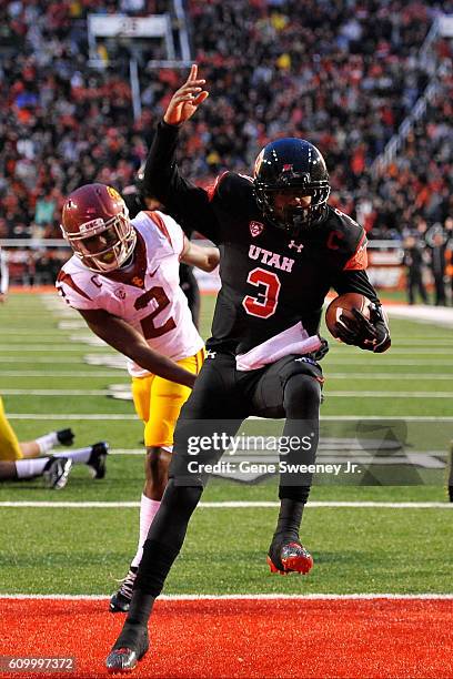 Quarterback Troy Williams of the Utah Utes scores a first quarter touchdown against the USC Trojans at Rice-Eccles Stadium on September 23, 2016 in...