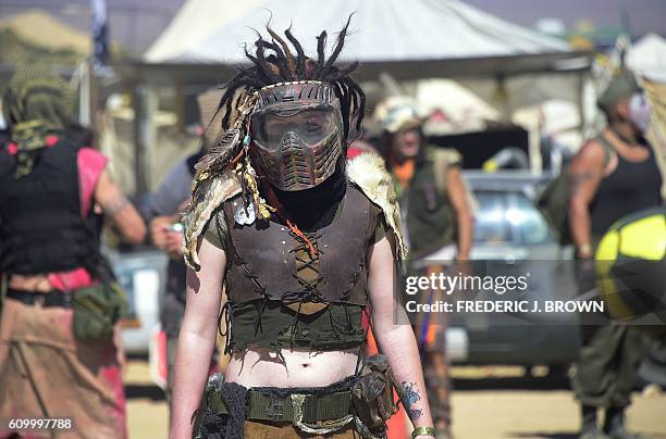 Festival goers attend day two of Wasteland Weekend in the high desert community of California City in the Mojave Desert, California, on September 23,...