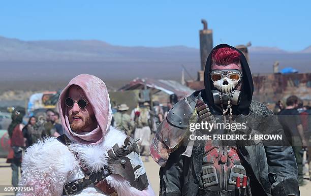 Festival goers attend day two of Wasteland Weekend in the high desert community of California City in the Mojave Desert, California, on September 23,...