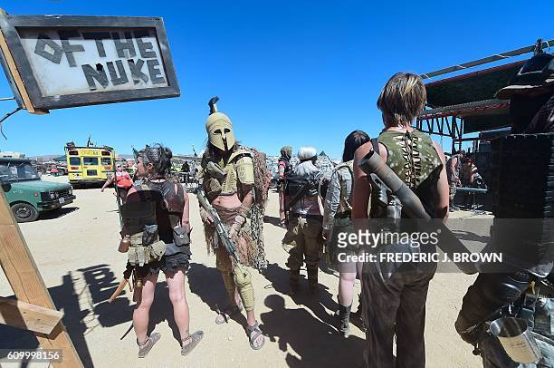 Festival goers attend day two of Wasteland Weekend in the high desert community of California City in the Mojave Desert, California, on September 23,...