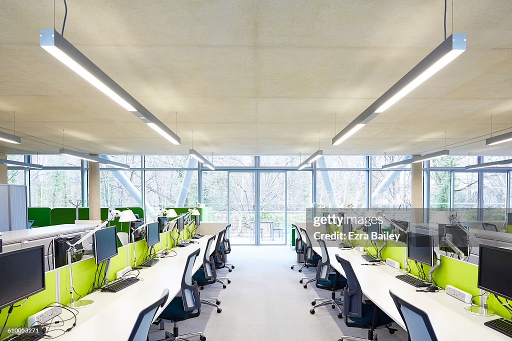 Modern open plan office with hot desks.