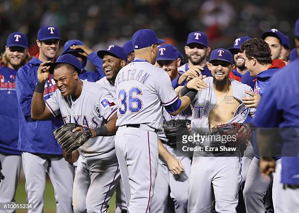 The Texas Rangers, including Adrian Beltre and Rougned Odor, celebrate after they clinched the American League West Division Title by beating the...