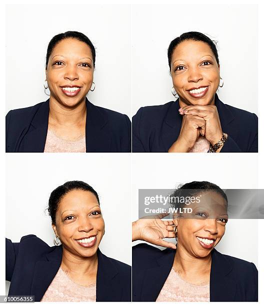 young women smiling in photo booth - passport sized photograph stock pictures, royalty-free photos & images