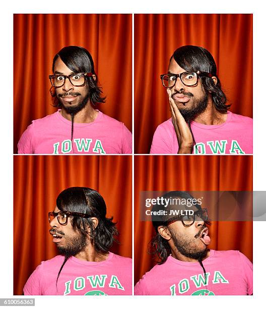 young man pulling faces in photo booth - photo strip stock pictures, royalty-free photos & images