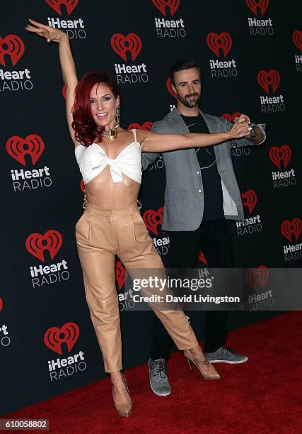 Dancer/TV personality Sharna Burgess and race car driver James Hinchcliffe attend the 2016 iHeartRadio Music Festival Night 1 at T-Mobile Arena on...