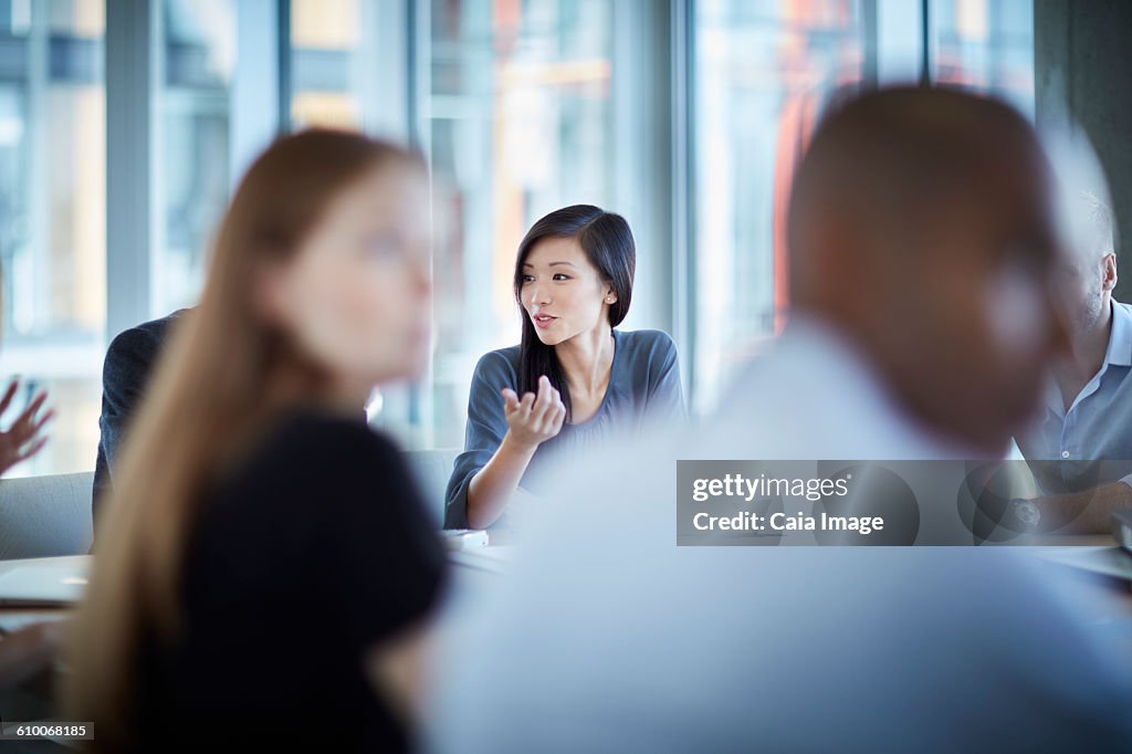 Businesswoman gesturing in meeting