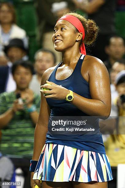 Naomi Osaka of Japan celebrates the winner Elina Svitolina of the Ukraine during women's singles semifinal match day 6 of the Toray Pan Pacific Open...