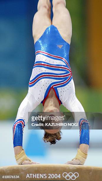 Emilie Le Pennec of France performs on the vault in the women's Artistic Gymnastics qualifications, 15 August 2004 at the Olympic Indoor Hall during...
