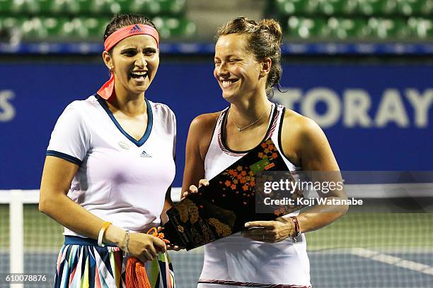 Sania Mirza of India and Barbora Strycova of Czech Republic celebrate the winner during women's Doubles Final match day 6 of the Toray Pan Pacific...