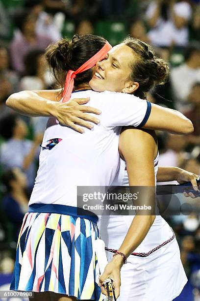 Sania Mirza of India and Barbora Strycova of Czech Republic celebrate the winner Chen Liang and Zhaoxuan Yang of China during women's Doubles Final...