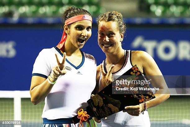 Sania Mirza of India and Barbora Strycova of Czech Republic celebrate the winner during women's Doubles Final match day 6 of the Toray Pan Pacific...