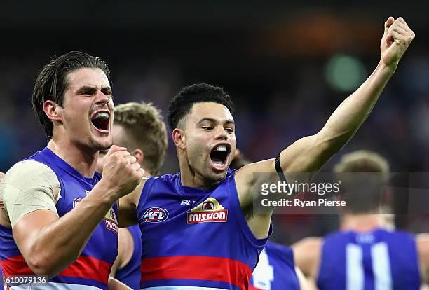 Jason Johannisen and Tom Boyd of the Bulldogs celebrate victory during the AFL First Preliminary Final match between the Greater Western Sydney...