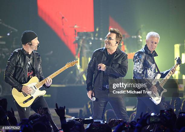 The Edge, Bono and Adam Clayton of U2 perform onstage during the 2016 iHeartRadio Music Festival - Night 1 held at T-Mobile Arena on September 23,...