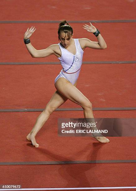 - Emilie Le Pennec of France competes in floor exercices during the World Cup Gymnastics's final at Gent's topsporthal, on May 13 in Belgium. Emilie...