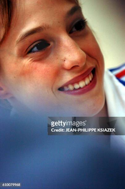 France's Emilie Le Pennec gives a press conference on August 23, 2004 in Athens, the day after winning the gold medal in the women's artistic...