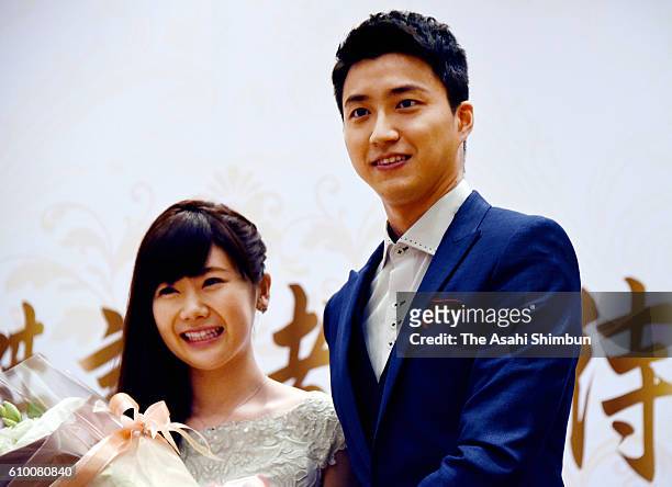 Table tennis players Ai Fukuhara and Chiang Hung-Chieh attend a press conference announcing their marriage on September 22, 2016 in Taipei, Taiwan.