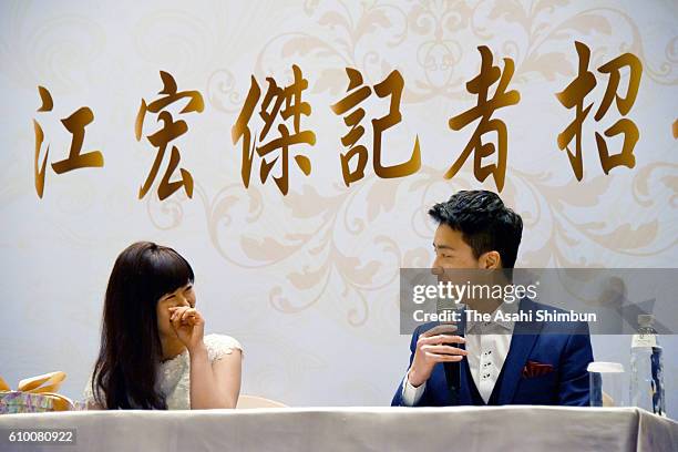 Table tennis players Ai Fukuhara and Chiang Hung-Chieh attend a press conference announcing their marriage on September 22, 2016 in Taipei, Taiwan.