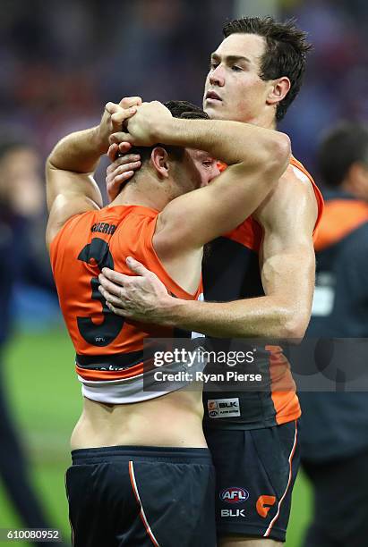 Stephen Coniglio and Jeremy Cameron of the Giants look dejected after the AFL First Preliminary Final match between the Greater Western Sydney Giants...