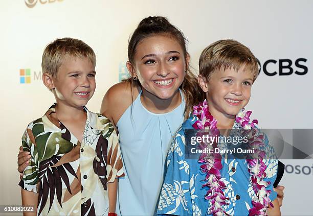 Actors Zach Sulzbach, Teilor Grubbs and Luke Salzbach pose for a photo as the arrive at the CBS 'Hawaii Five-0' Sunset On The Beach Season 7 Premier...