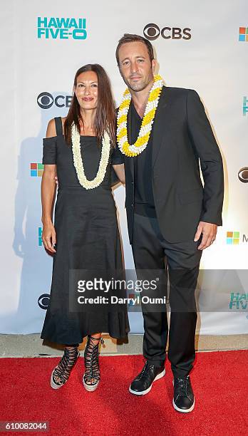 Actor Alex O'Loughin and his wife Malia Jones arrive at the CBS 'Hawaii Five-0' Sunset On The Beach Season 7 Premier Event at Queen's Surf Beach on...