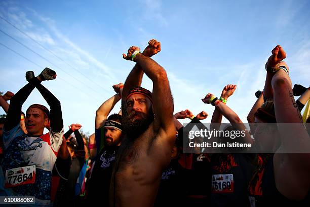 Participants prepare for the start of the 2016 Tough Mudder - London South at Holmbush Farm on September 24, 2016 in Horsham, England.