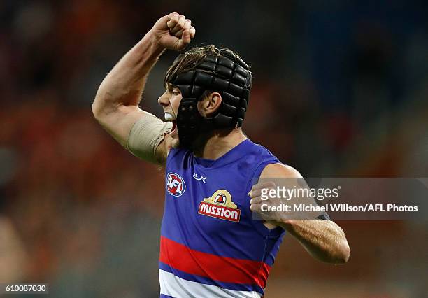 Caleb Daniel of the Bulldogs celebrates a goal during the 2016 AFL First Preliminary Final match between the GWS Giants and the Western Bulldogs at...