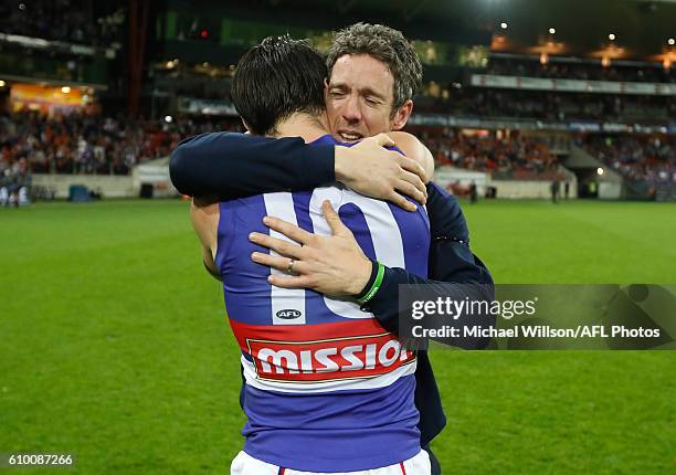 Easton Wood and Robert Murphy of the Bulldogs celebrate during the 2016 AFL First Preliminary Final match between the GWS Giants and the Western...