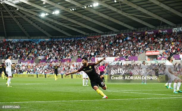 Manchester City's Argentinian striker Sergio Aguero celebrates scoring the opening goal during the English Premier League football match between...