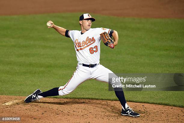 Tyler Wilson of the Baltimore Orioles pitches during a baseball game against the against the Boston Red Sox at Oriole Park at Camden Yards on...
