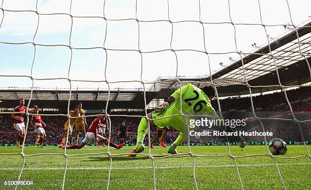Heung-Min Son of Tottenham Hotspur scores his sides first goal during the Premier League match between Middlesbrough and Tottenham Hotspur at the...