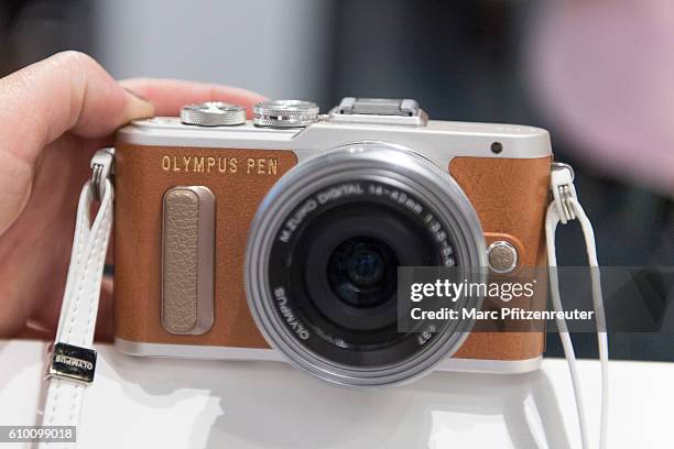 The new Olympus PEN E-PL8 camera is presented at the 2016 Photokina trade fair on September 24, 2016 in Cologne, Germany. Photokina is the world's...