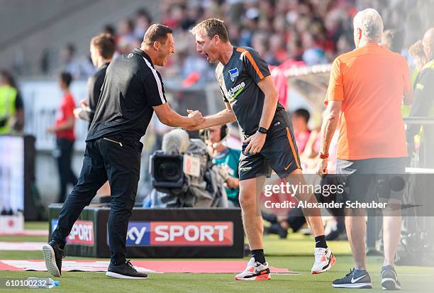 Head coach Pal Dardai of Hertha BSC celebrates the third goal for his team during to the Bundesliga match between Eintracht Frankfurt and Hertha BSC...